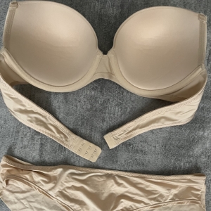 ست شورت و سوتین ابری مدل لیزری طرح ساده رنگ کرم